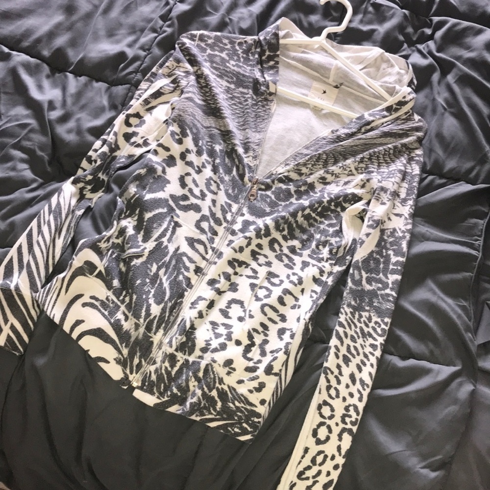 A white leopard light hoodie jacket